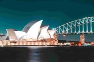 Sydney skyline with the Opera House and Harbour Bridge — a top pet-friendly destination for international relocations.