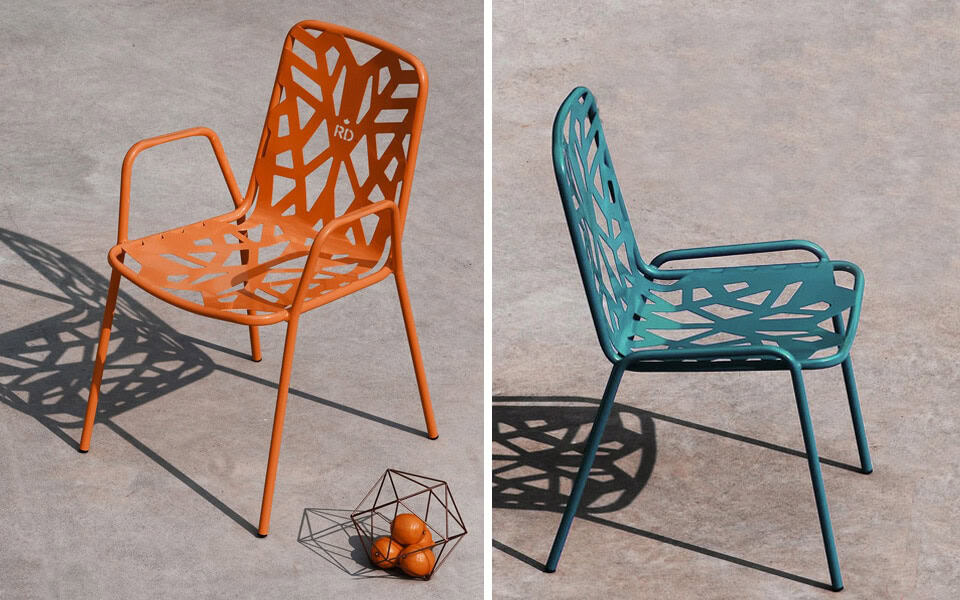 Colorful Modern Chairs With Geometric Cutouts For Outdoor Seating.