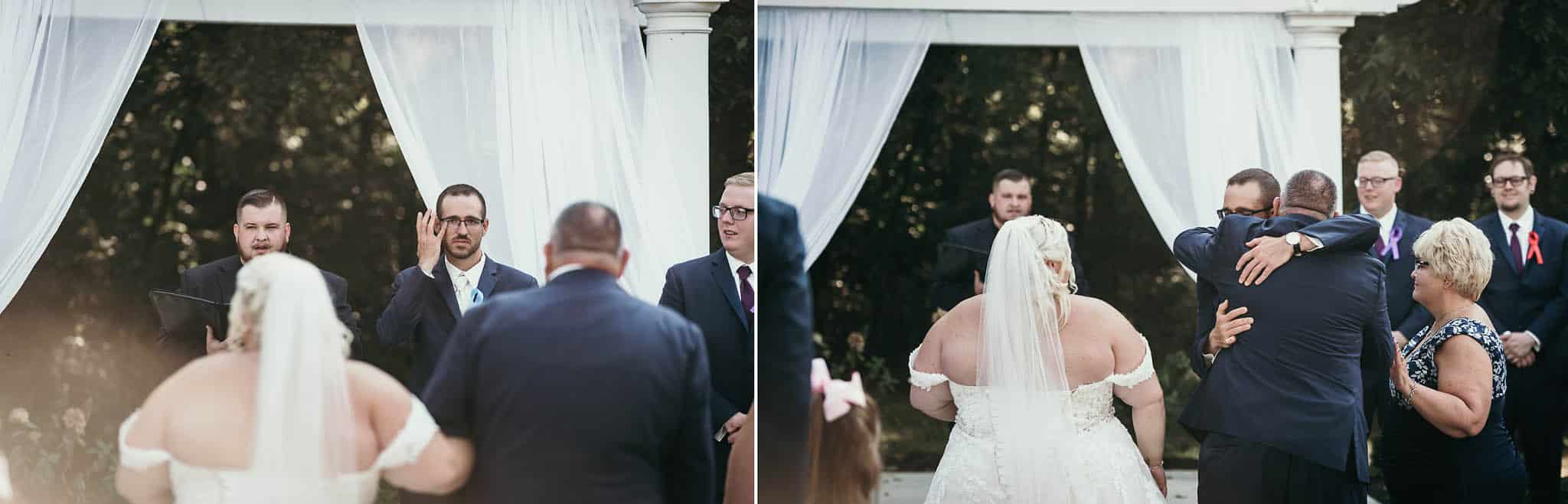 Groom seeing bride walking down the aisle