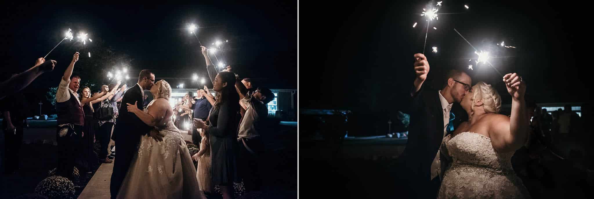 Bride and groom kissing under sparklers at night during reception of intimate fall wedding at the Lodge at River Valley in Yorktown, Indiana