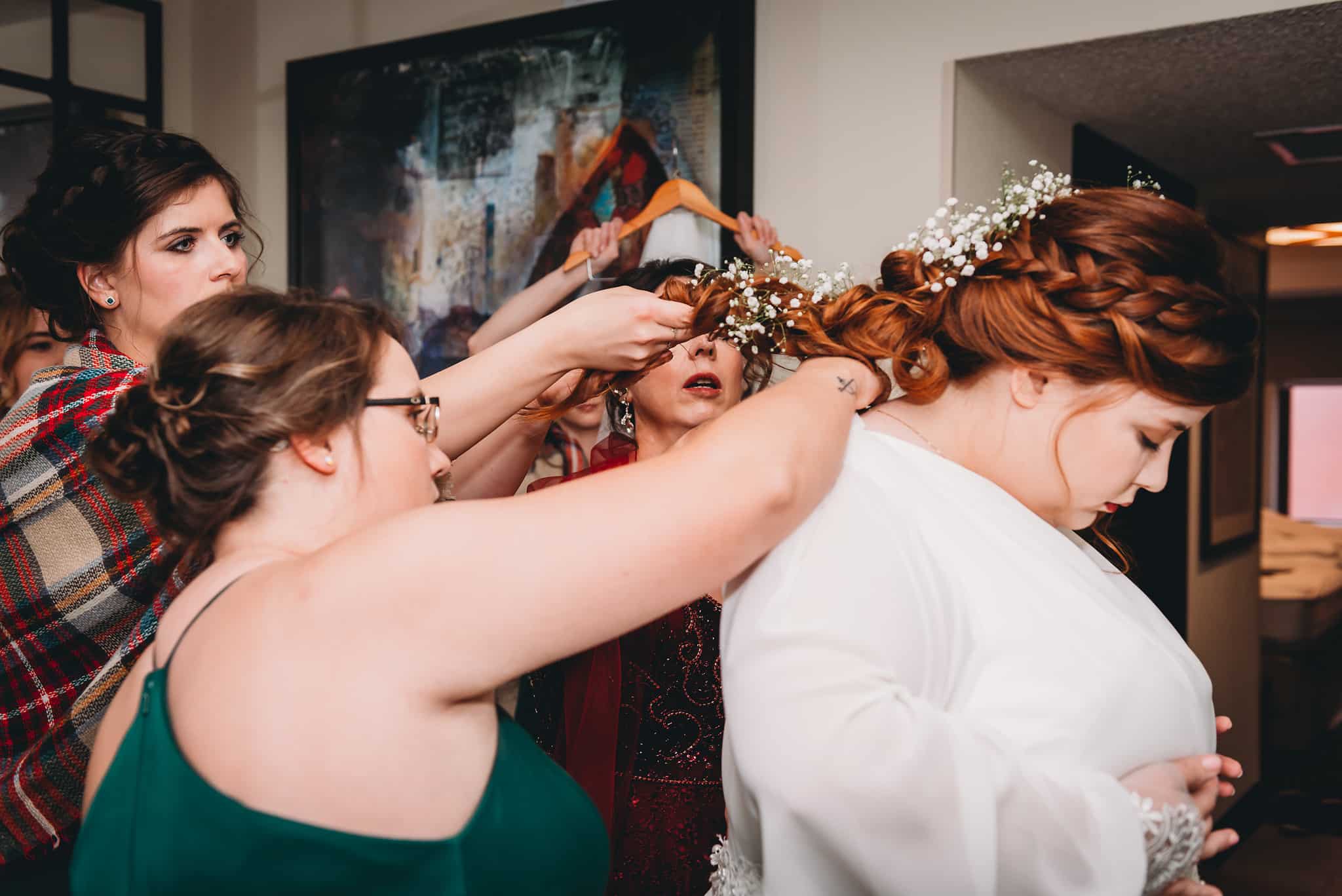 bride getting in dress indianapolis wedding