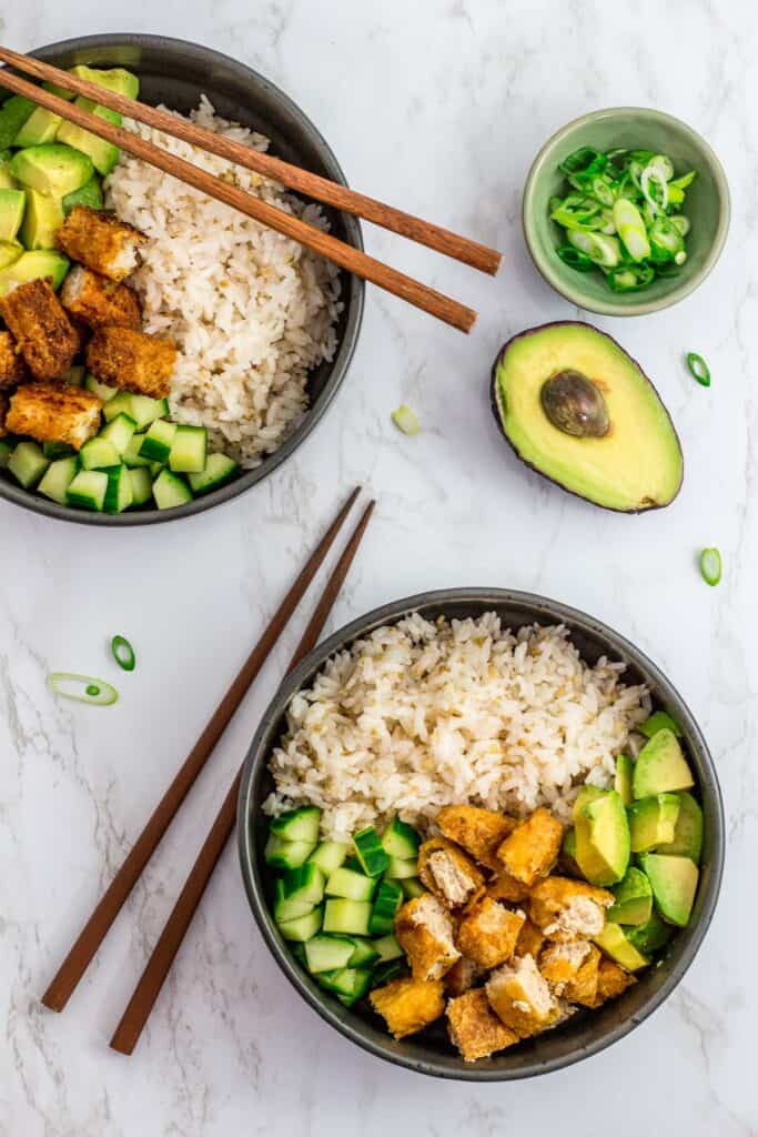 overhead shot of two sushi bowls without spicy mayo