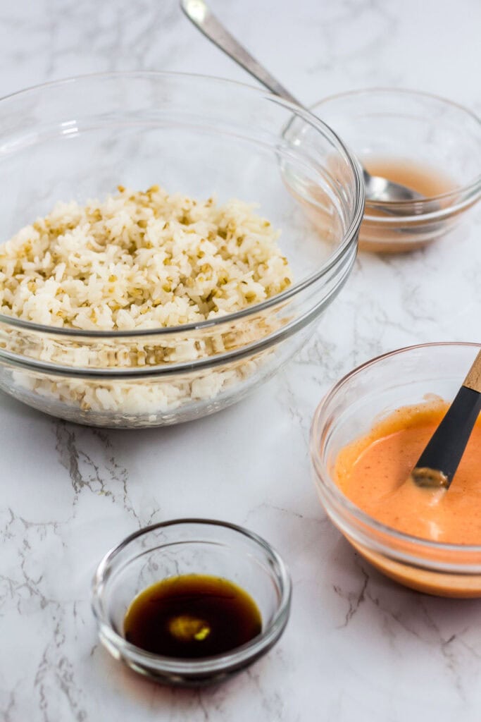 rice, seasoning, soy sauce, and spicy mayo