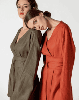" models standing wearing two linen kimonos from different colors made by atelier MIZUNI