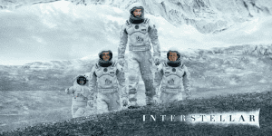 Interstellar movie scene with astronauts in icy landscape.