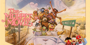 Muppet characters in a car from The Muppet Movie, colorful and lively scene.