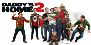 Group of men in Christmas sweaters celebrating around a decorated Christmas tree.