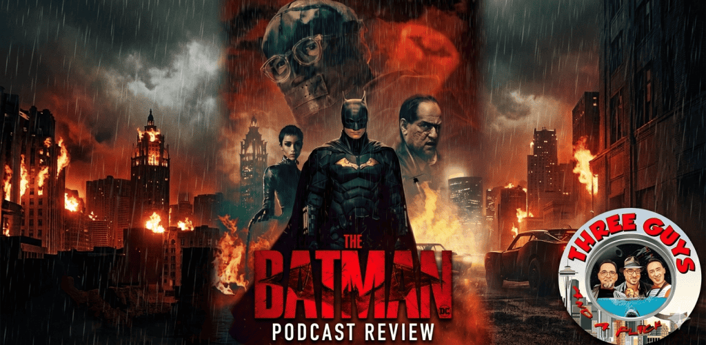 Batman and allies in a fiery cityscape from The Batman movie.