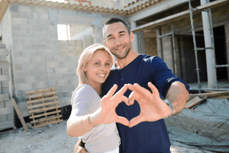 couple visiting new home construction site with A1 ADU Contractor | LA ADU Building Experts