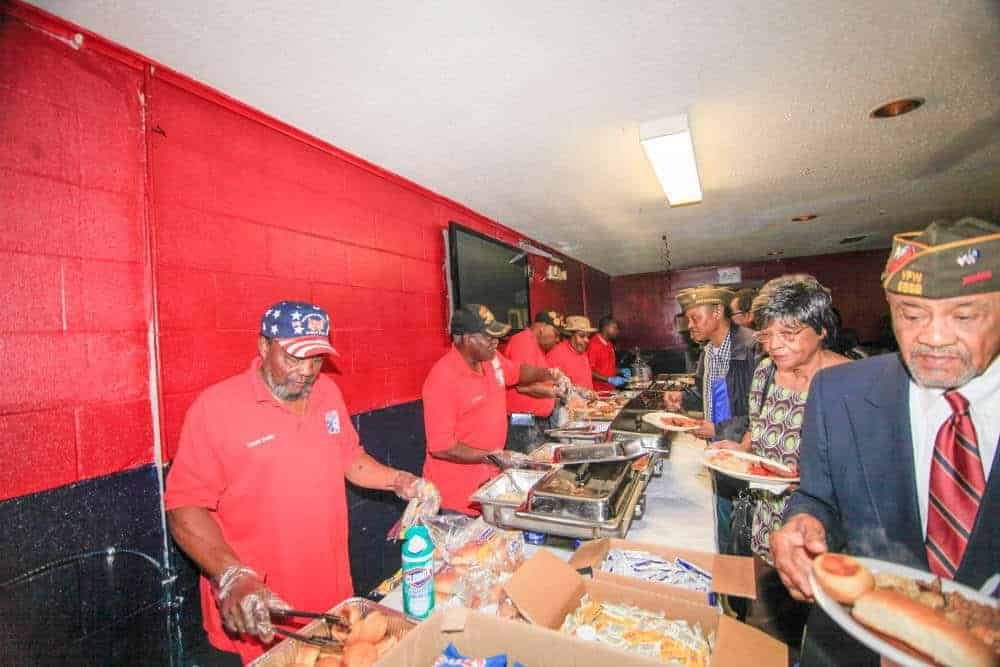 Veterans being served meal at Veterans Day Dinner