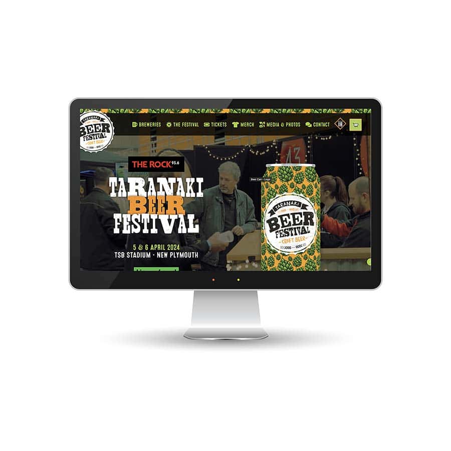 Taranaki Beer Festival website Vibrant beer festival webpage displayed on a computer monitor.