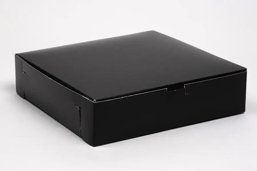 Black bakery box for packaging baked goods and pastries.