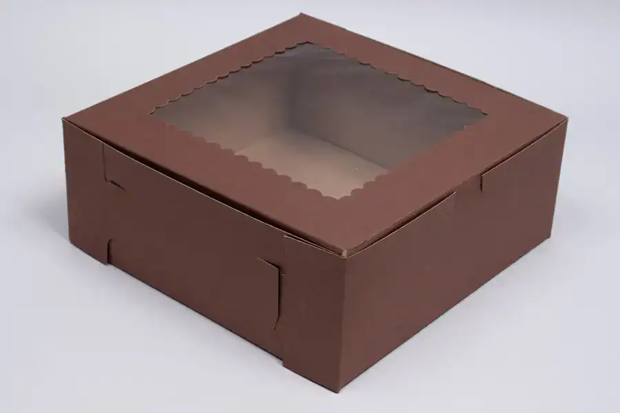 Clear window cupcake packaging for bakery treats.