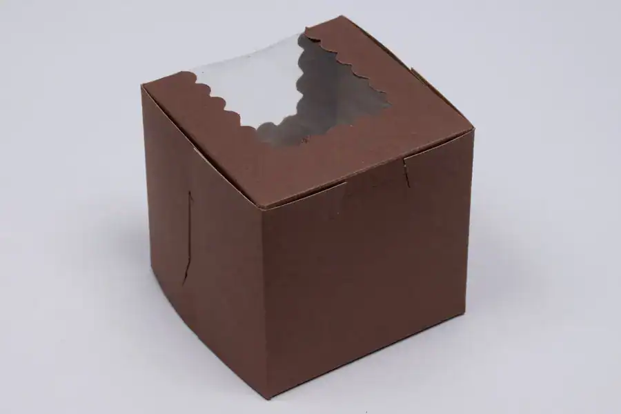 Customizable chocolate cupcake packaging with window for display.
