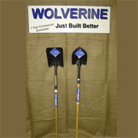 Two Wolverine long handle round point steel shovels for heavy-duty digging.