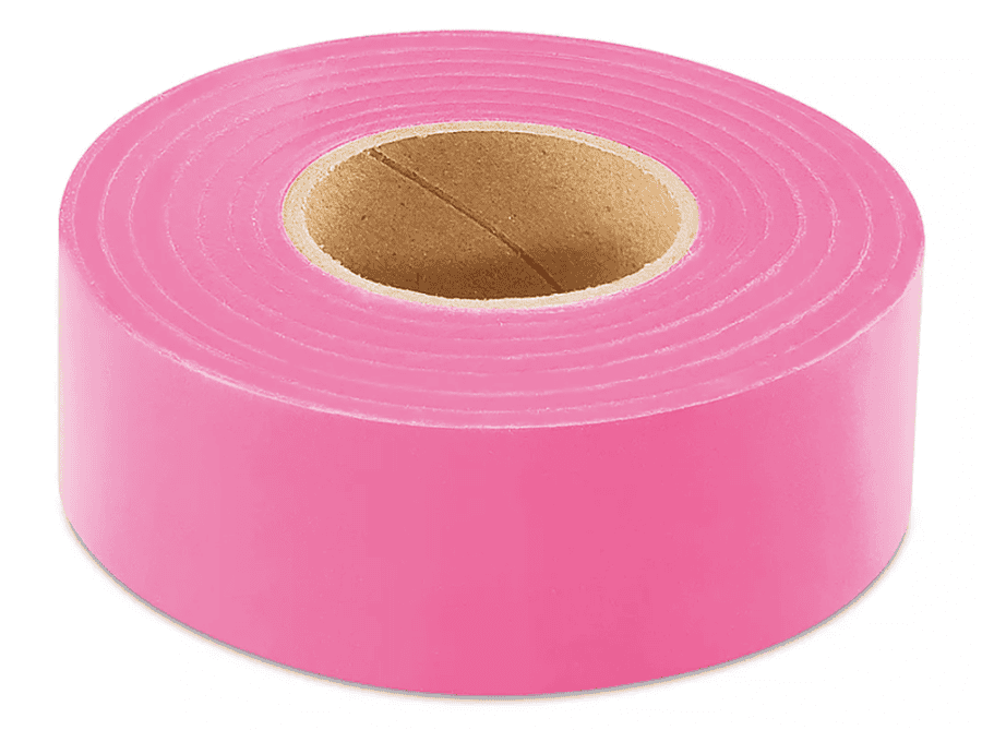Pink flagging tape for marking and safety applications, ideal for construction, landscaping, and out.