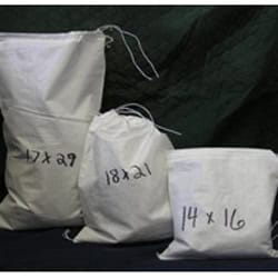 Durable woven polypropylene sandbags with drawstring closure, ideal for construction, landscaping, a.