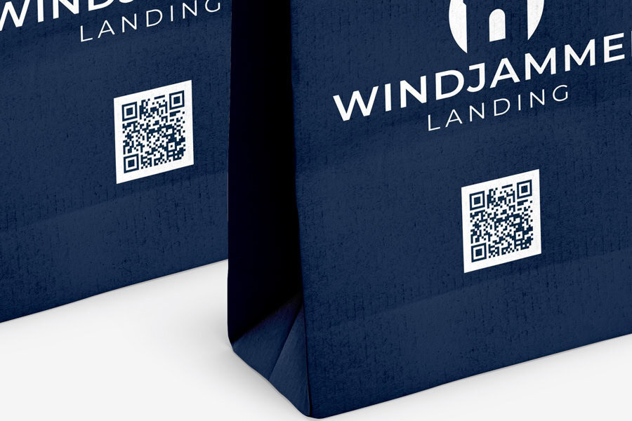 Branded shopping bags with QR codes printed on the side