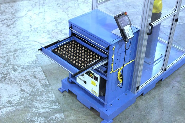 Automated tray handling system for efficient manufacturing processes.