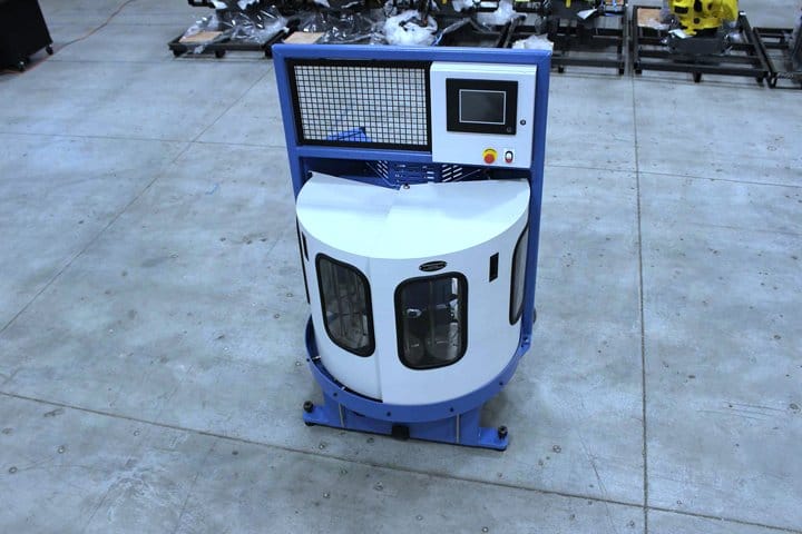 Automated robot from Adaptec Solutions with control panel and safety features.