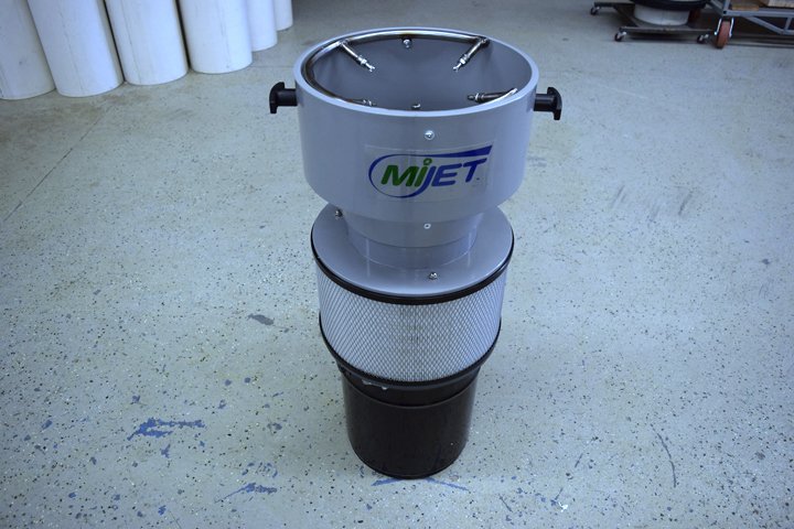 Adaptec Solutions air filtration unit with MJET logo for industrial air purification.