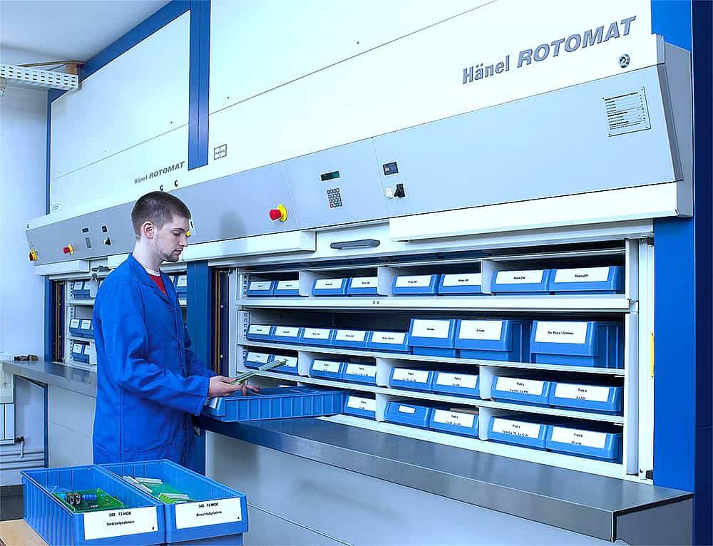 Automated storage system by Adaptec Solutions with organized bins for efficient inventory management.