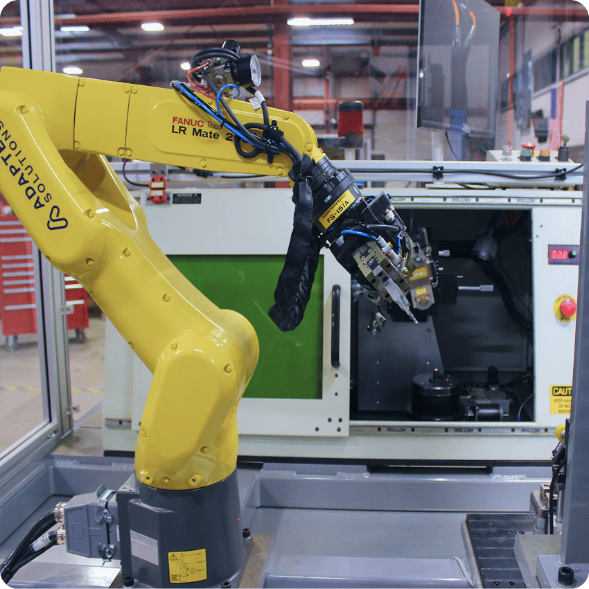 LR Mate handling parts into CNC machine in a machine tending application