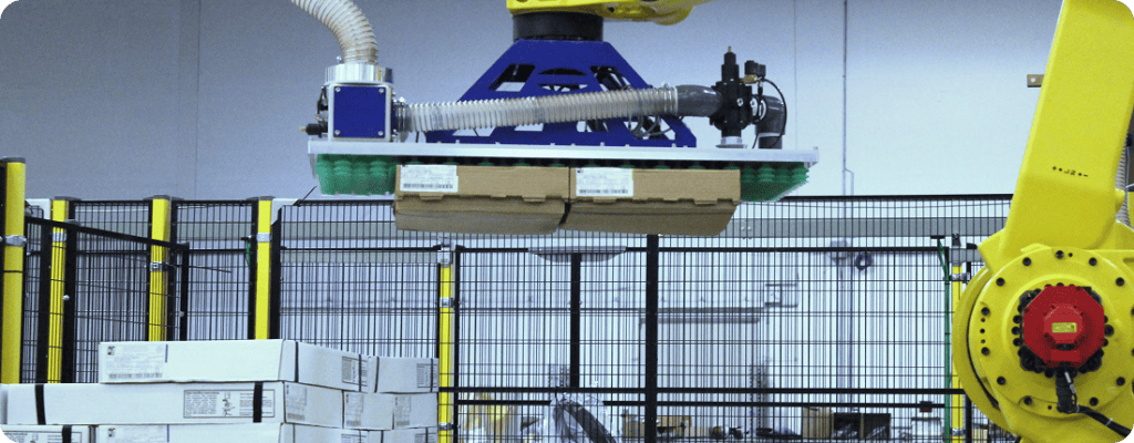 Robotic palletizing solution using vacuum end-of-arm tooling to pick cases