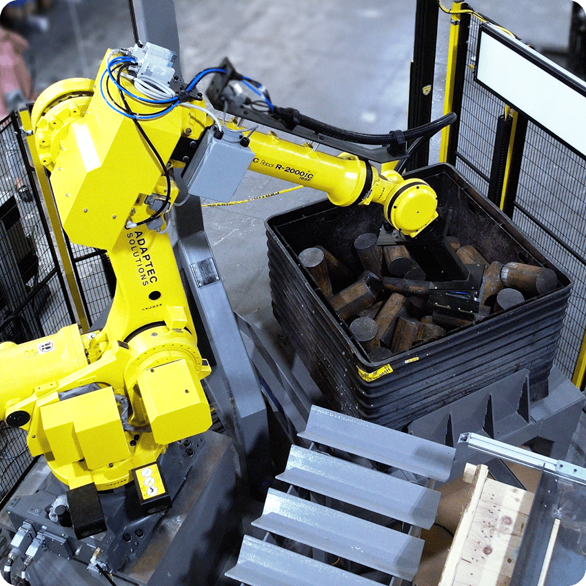 automated bin picking system with yellow FANUC robot
