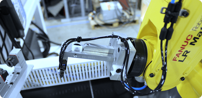 close up shot of the end-of-arm tool on a FANUC robot