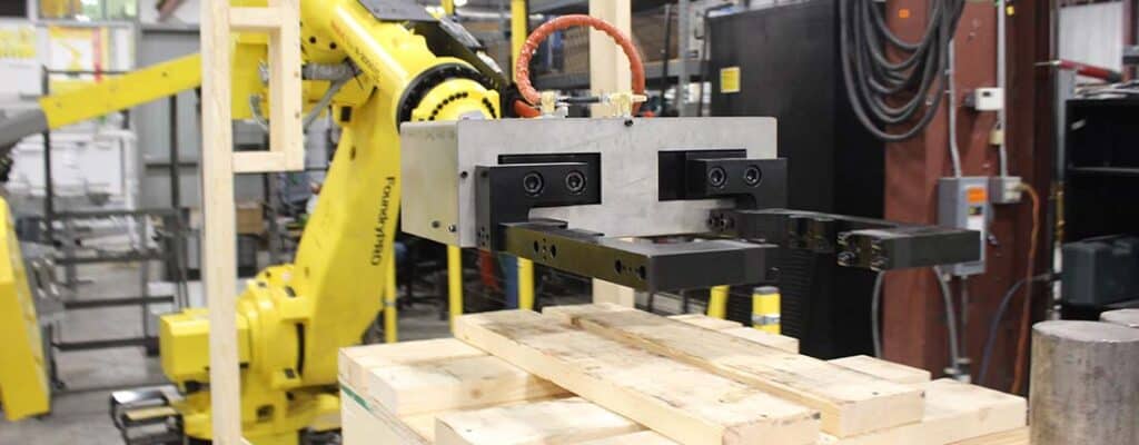 robotic end-of-arm-tooling on a foundry pro FANUC robot
