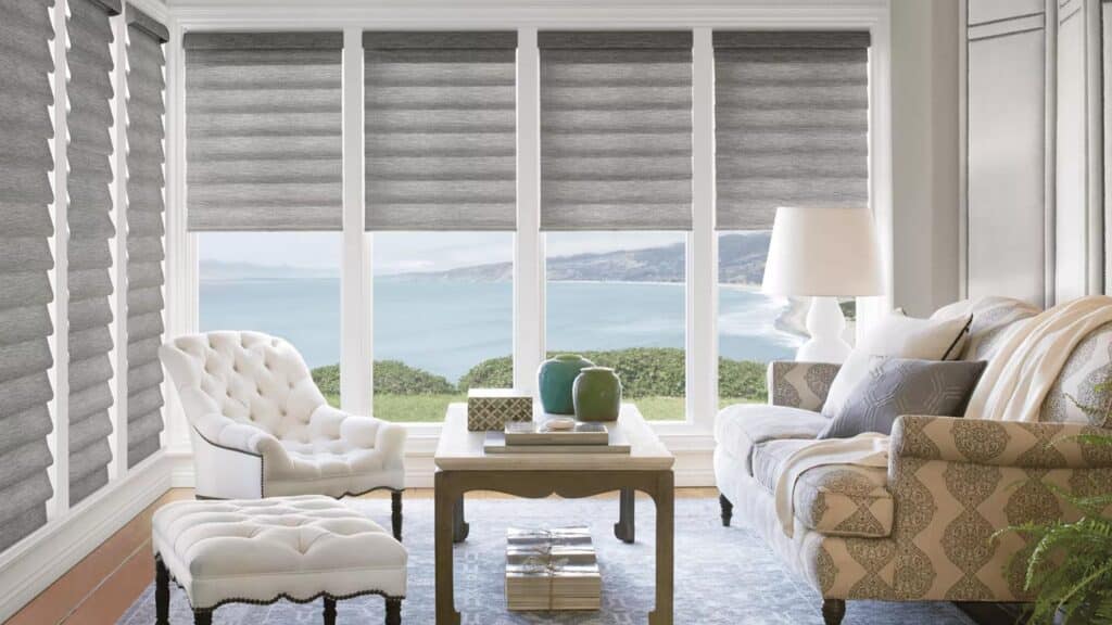 Luxurious window roller blinds with a scenic ocean view, enhancing natural light and interior aesthetics. Perfect for home decor and energy efficiency.