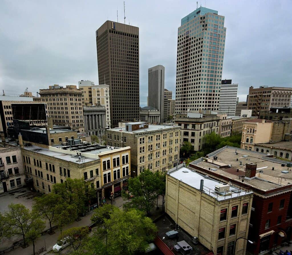City skyline with tall office buildings and historic architecture, showcasing urban design and cityscape views.