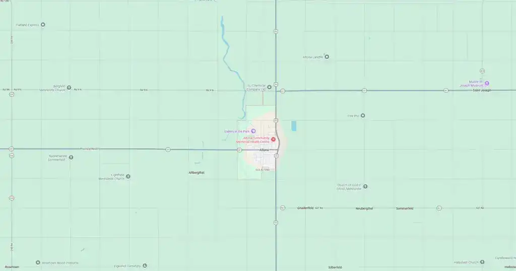 Map of a small town with roads, streets, and surrounding areas, showing geographic layout and key locations.