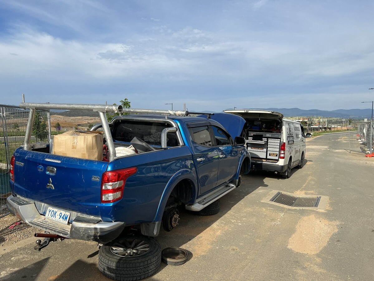 Mitsubishi Triton fleet vehicle service and brake replacement completed on-site job site Canberra