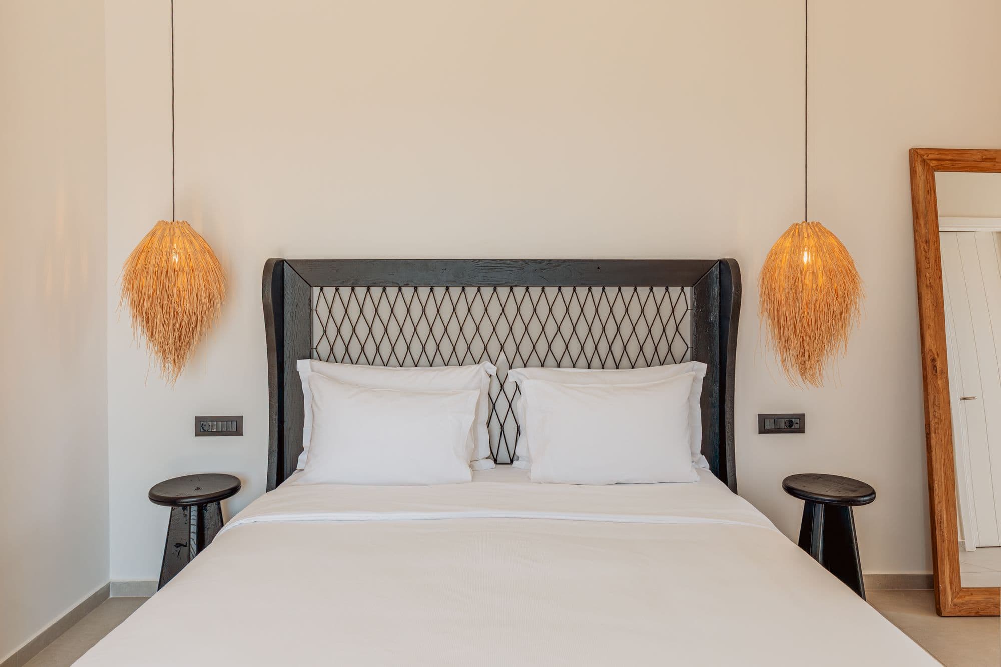 Contemporary Mykonos hotel room with modern furnishings and stylish decor.