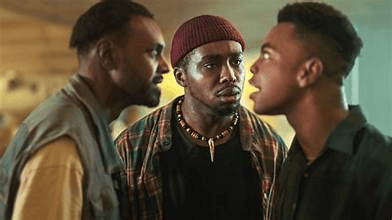 African movie scene featuring intense confrontation among three young actors.