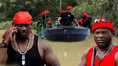 African men in traditional attire, filming in a river with a boat, highlighting African culture and cinema.