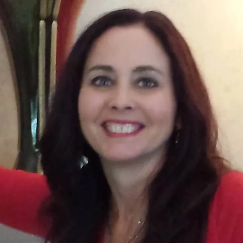 Smiling woman in red top representing Allevia Technology in Maryville.