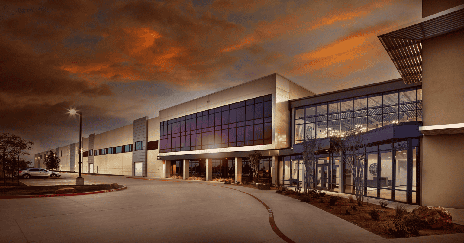 Modern building at sunset with glass facade