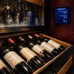 Cave à vin comment choisir : bouteilles en clayettes, température stable