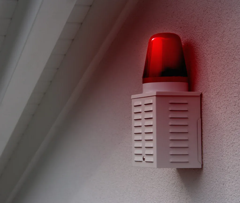 close-up-of-alarm-box-with-red-light-