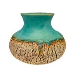 Wheel-thrown stoneware vase with flowing matte turquoise glaze, fine textured surface and iron oxide finish by Amelia Johannsen