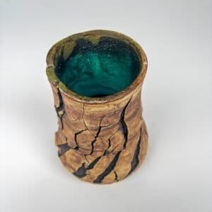 Handmade stoneware vase with dramatic natural fractures and turquoise glazed interior by Amelia Johannsen
