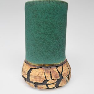 Modern handmade ceramic vase with matte turquoise glaze and naturally fractured stoneware base by Amelia Johannsen