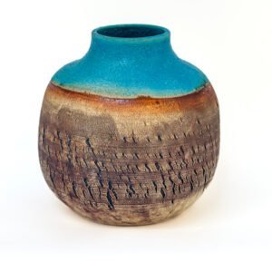 Handmade stoneware vase with fine vertical cracked texture, iron oxide finish and matte turquoise glaze by Amelia Johannsen
