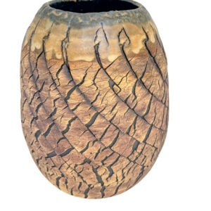 Handcrafted stoneware vessel from the Faultline series with iron crackled texture, softly weathered glazed rim and sculptural organic form.