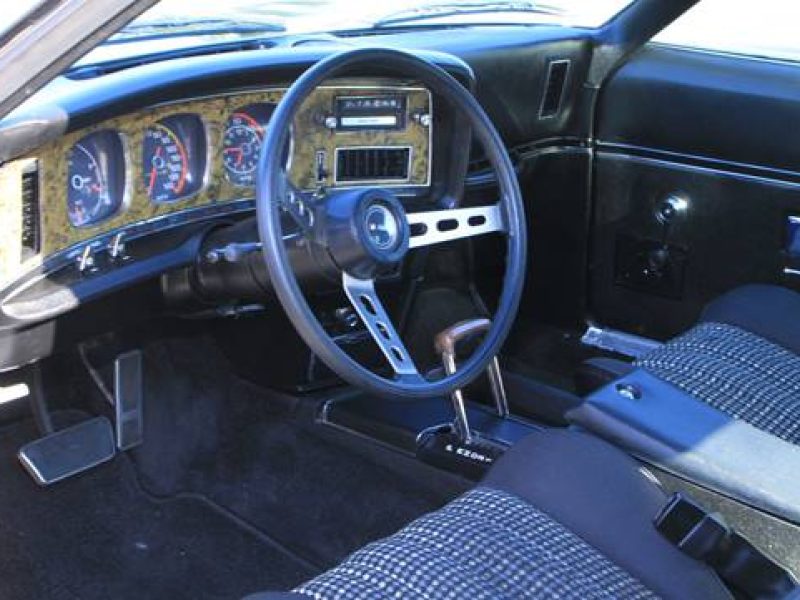 Vintage car interior at Americarna event, showcasing classic American muscle cars in New Zealand.