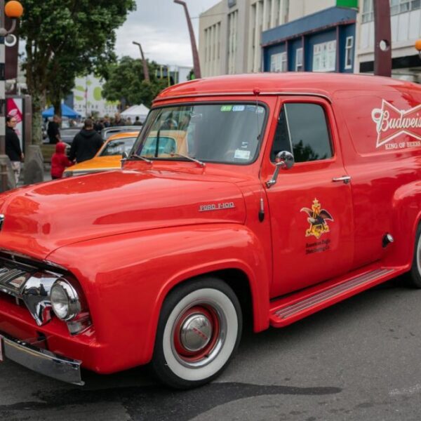 F100 Ford vintage delivery van at Americarna event in New Zealand, classic American car show.
