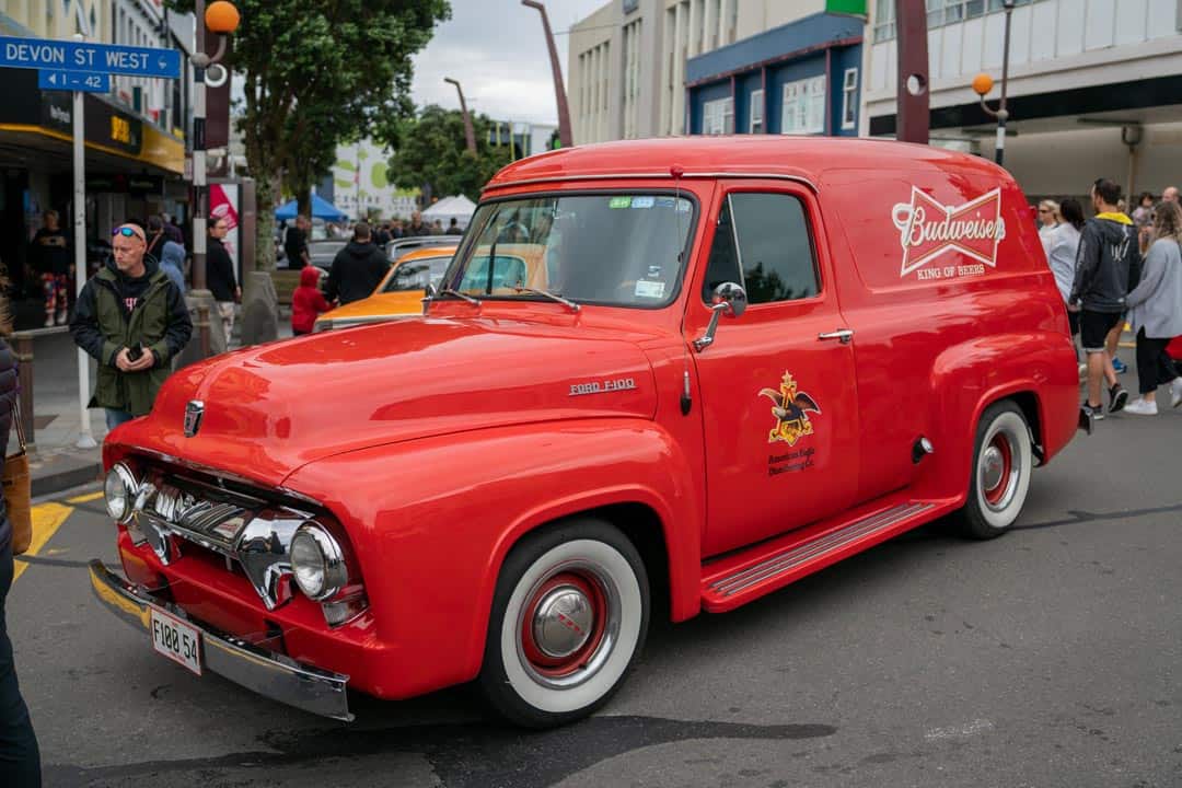 AmericarnaNewPlymouthCarnival-02867 F100 Ford vintage delivery van at Americarna event in New Zealand, classic American car show.
